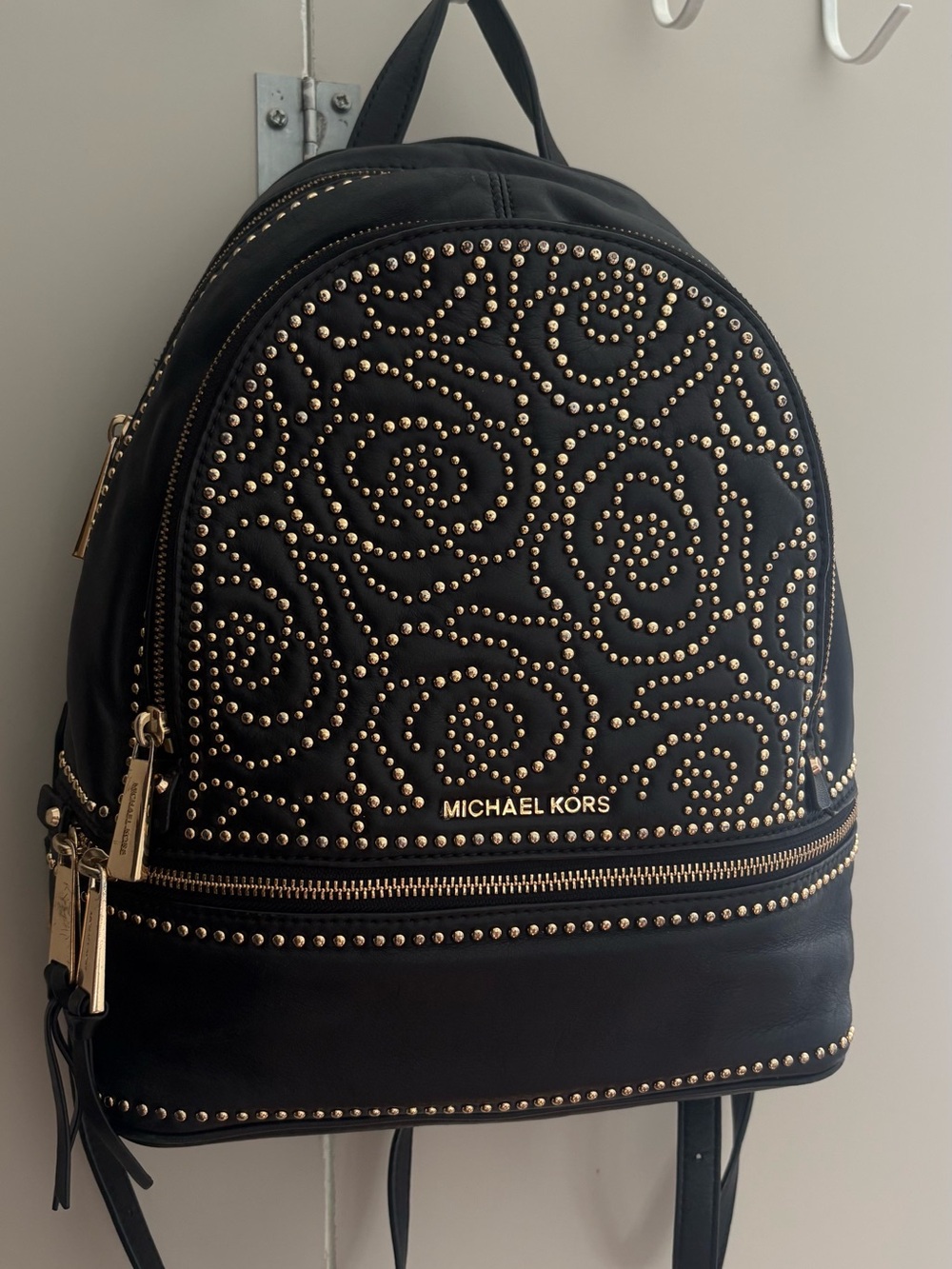 Michael Kors Black Leather Backpack with Gold Stud Floral Design